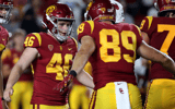  USC Denis Lynch is congratulated by teammates after completing a field goal against Fresno State at the Coliseum in Los Angeles. on Saturday night, Sep. 17, 2022. (Luis Sinco / Los Angeles Times)