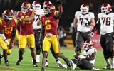 Defensive back Mekhi Blackmon #6 of the USC Trojans reacts after a tackle against running back Jaylen Jenkins #29 of the Washington State Cougars for a loss of yards in the second half of an NCAA football game at the Los Angeles Memorial Coliseum in Los A