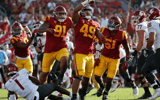 USC Trojans defensive lineman Tuli Tuipulotu (49) reacts after sacking Washington State Cougars quarterback Cameron Ward (1) in the first half at the Coliseum on October 8, 2022 in Los Angeles, California.(Gina Ferazzi / Los Angeles Times via Getty Images