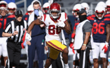 Wide receiver John Jackson III #80 of the USC Trojans runs with the football after a 23-yard reception against the Arizona Wildcats during the first half of the PAC-12 football game at Arizona Stadium on November 14, 2020 in Tucson, Arizona. (Photo by Chr