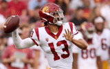 Caleb Williams #13 of the USC Trojans throws a touchdown pass to Jordan Addison #3 of the USC Trojans in the first quarter against the Stanford Cardinal at Stanford Stadium on September 10, 2022 in Stanford, California. (Photo by Ezra Shaw/Getty Images)