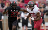 STANFORD, CALIFORNIA - NOVEMBER 05: Nakia Watson #25 of the Washington State Cougars runs with the ball pursued by David Bailey #23 of the Stanford Cardinal during the second quarter of an NCAA football game at Stanford Stadium on November 05, 2022 in Sta
