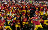 USC Trojans players celebrate on the field after the Trojans defeated the Notre Dame Fighting Irish 38 to 27 in a college football game played on November 26, 2022 at the Los Angeles Memorial Coliseum in Los Angeles, CA. (Photo by John Cordes/Icon Sportsw