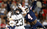 Arizona Wildcats cornerback Christian Roland-Wallace #4 deflects a pass intended for Oregon Ducks wide receiver Chase Cota #23 during the second half of a football game between the University of Oregon Ducks and the University of Arizona Wildcats on Octob