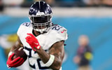 derrick-henry-delivers-epic-stiff-arm-shows-off-power-tennessee-titans-jacksonville-jaguars-rayshawn