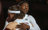 South Carolina players Hayden Brown and GG Jackson share a hug before a game at Colonial Life Arena