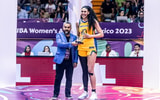 Kamilla Cardoso receives her AmeriCup MVP trophy