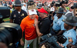 Auburn head coach Hugh Freeze and Georgia head coach Kirby Smart