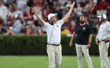 South Carolina head coach Shane Beamer throws his hands up in a game against Florida