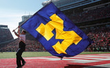 Michigan Wolverines logo on a flag