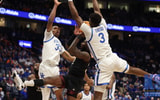Adou Thiero Ugonna Onyenso attempt to block a Texas AM shot for Kentucky