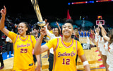 USC Trojans guard JuJu Watkins (12) celebrates with USC Trojans guard McKenzie Forbes (25) after the Trojans defeated the UCLA Bruins 80-70 in double overtime at MGM Grand Garden Arena