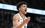 Oakland Golden Grizzlies forward Trey Townsend (4) celebrates after making a shot and being fouled against the Milwaukee Panthers during the second half at Indiana Farmers Coliseum - Robert Goddin, USA TODAY Sports