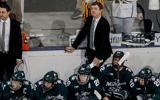 Michigan state head coach Adam Nightingale watches a replay against Michigan during the second period at Yost Ice Arena in Ann Arbor on Friday, Feb. 9, 2024 - Junfu Han, USA TODAY Sports