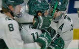 Michigan State senior Jeremy Davidson is swarmed by teammates Maxim Štrbàk and Nico Müller after Davidson’s game-winning goalie in the NCAA Tournament Regional Semifinal victory over Western Michigan, Friday at Centene Community Ice Center in Maryland Heights, MO.