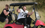Jacksonville Jaguars center Luke Fortner and offensive tackle Ben Bartch ride on a golf cart during practice - Kirby Lee-USA TODAY Sports