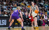 Apr 1, 2024; Albany, NY, USA; Iowa Hawkeyes guard Caitlin Clark (22) controls the ball against LSU Lady Tigers guard Hailey Van Lith (11) in the third quarter in the finals of the Albany Regional in the 2024 NCAA Tournament at MVP Arena. Mandatory Credit: Gregory Fisher-USA TODAY Sports