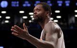 New York Knicks forward Julius Randle gestures at the fans during the fourth quarter against the Brooklyn Nets - Brad Penner-USA TODAY Sports