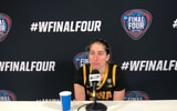 Kate Martin speaks with the media after the national championship game. (Photo by Kyle Huesmann)