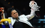 South Carolina Gamecocks head coach Dawn Staley cuts the net after defeating the Iowa Hawkeyes in the finals of the Final Four of the womens 2024 NCAA Tournament at Rocket Mortgage FieldHouse. Mandatory Credit: Ken Blaze-USA TODAY Sports