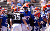 Florida Gators quarterback Graham Mertz (15) talks with his team in a huddle during the second half at the Orange and Blue spring football game at Steve Spurrier Field at Ben Hill Griffin Stadium in Gainesville, FL on Saturday, April 13, 2024. [Matt Pendleton/Gainesville Sun]