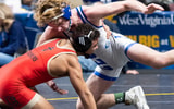 Conwell-Egan's Charlie Robson (right) wrestles to a 4-2 decision over Bishop McCourt's Mason Gibson during the 133-pound third place bout at the PIAA Class 2A Wrestling Championships at the Giant Center on March 9, 2024, in Hershey. Dan Rainville / USA TODAY NETWORK