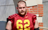 USC offensive lineman Cooper Lovelace walks out for a practice with the Trojans