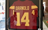 A USC football jersey signed by quarterback Sam Darnold up for auction at the Legends of Troy event from House of Victory
