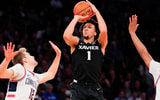 Xavier Musketeers guard Desmond Claude (1) shoots past Connecticut Huskies guard Cam Spencer (12) during the second half at Madison Square Garden