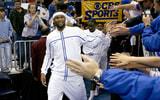 Kentucky Wildcats forward DeMarcus Cousins (15) shakes hands with fans as the Wildcats run onto the court to face the Wake Forest Demon Deacons in the second round of the 2010 NCAA mens basketball tournament - Crystal LoGiudice-USA TODAY Sports