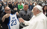 Father Jim Sichko presents Pope Francis with a Mark Pope Kentucky jersey - Photo courtesy of Jim Sichko