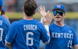 Kentucky Baseball players high-five each other - Tyler Ruth, UK Athletics