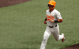 Hunter Ensley runs home for another Tennessee run. Credit: UT Athletics