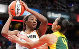 Indiana Fever forward Aliyah Boston (7) looks for an open teammate while being defended by Seattle Storm guard Skylar Diggins-Smith (4) on Thursday, May 30, 2024, during the WNBA game at Gainbridge Fieldhouse in Indianapolis. (Photo by Joe Timmerman/IndyStar / USA TODAY NETWORK)