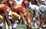 General view of the line of scrimmage as USC Trojans center Nico Falah (74) snaps the ball against the Utah State Aggies during a NCAA football game at Los Angeles Memorial Coliseum