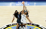 South Carolina basketball alum Kamilla Cardoso battling for the opening tip with former teammate Aliyah Boston. Photo Credit: Kamil Krzaczynski-USA TODAY Sports