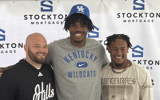 Western Hills coach Simon Vanderpool with Javeon Campbell and Wan'Dale Robinson