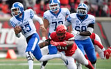 Former JUCO QB Stephen Johnson evades a UofL tackler