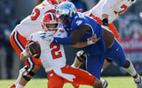 Dec 29, 2023; Jacksonville, FL, USA;  Clemson Tigers quarterback Cade Klubnik (2) is brought down by Kentucky Wildcats defensive lineman Deone Walker (0) in the third quarter during the Gator Bowl at EverBank Stadium. Mandatory Credit: Nathan Ray Seebeck-USA TODAY Sports
