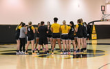 The Iowa Women's Basketball team meets at the conclusion of practice. (Photo by Dennis Scheidt)