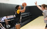 Jada Gyamfi looks to pass the ball during  a practice drill. (Photo by Dennis Scheidt)