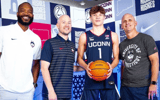Photo of Braylon Mullins (middle right) via UConn Athletics