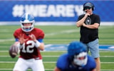 Mark Stoops closely watches a Kentucky football practice