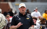 Southern Miss Golden Eagles' head coach Will Hall speaks to players after the spring game at the M.M. Roberts Stadium in Hattiesburg, Miss., on Saturday, Apr. 6, 2024.