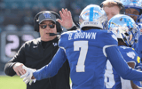 Mark Stoops congratulates Barion Brown after a play - Dr. Michael Huang | Kentucky Sports Radio
