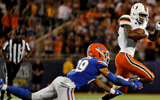 Aug 24, 2019; Orlando, FL, USA; Florida Gators defensive back Jeawon Taylor (29) attempts to bring down Miami Hurricanes wide receiver Mike Harley (3) during the second half at Camping World Stadium. Mandatory Credit: Jasen Vinlove-USA TODAY Sports