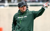 Michigan State's head coach Jonathan Smith communicates with staff on Saturday, April 20, 2024, at Spartan Stadium in East Lansing - Nick King, USA TODAY Sports