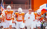 Texas HC Steve Sarkisian leads the Longhorns out of the tunnel against Colorado State