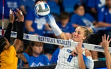 Brooke Bultema attacks at the net against Morehead - UK Athletics