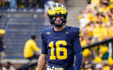 Michigan Wolverines football quarterback Davis Warren struggled against Arkansas State. (Photo by Junfu Han / USA TODAY NETWORK)